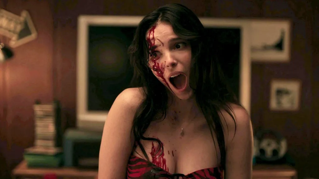 Inde Navarrette covered in blood in the psychological thriller Obsession
