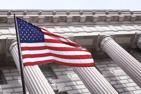 American Flag in Front of Federal Treasury Columns